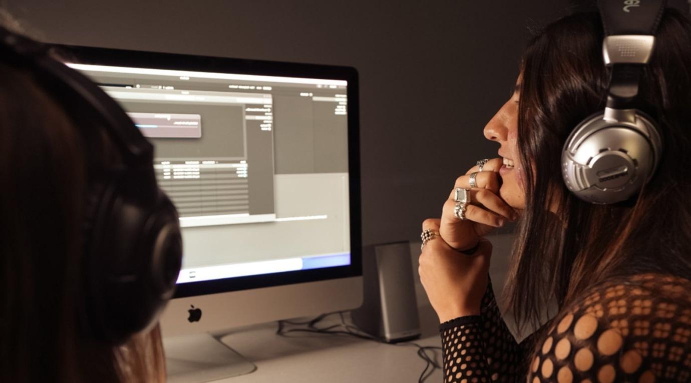 a media studies student edits in the production room